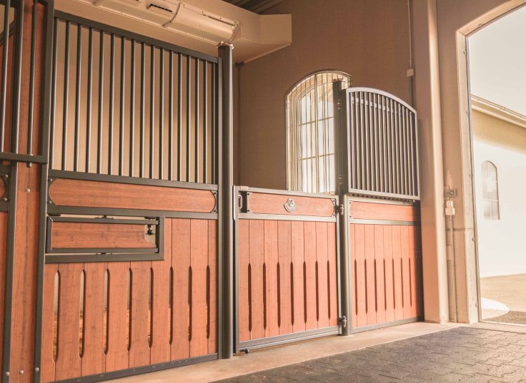 Angled view of the Hannover horse stall and part of the gate